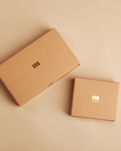Two plain kraft cardboard boxes ready to ship